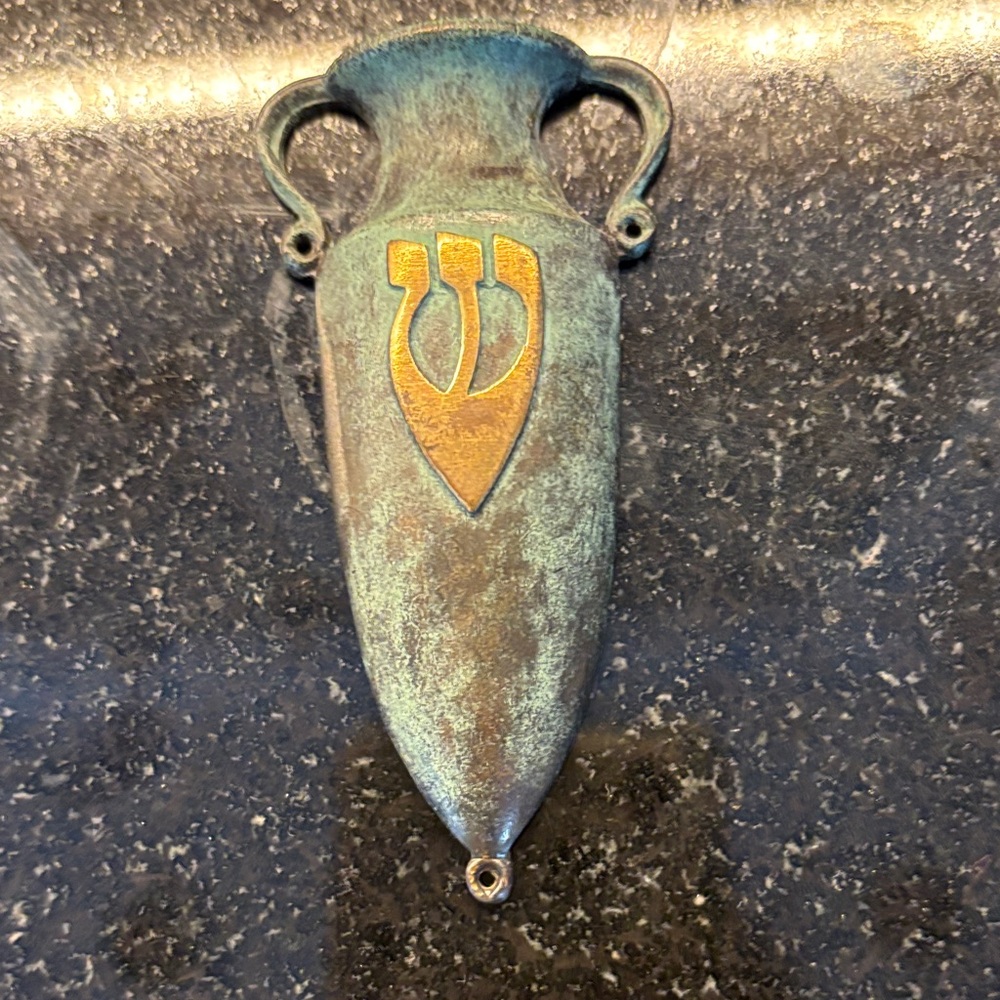 Vintage brass Mezuzah with the Hebrew letter “shin”